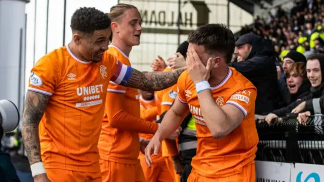 Rangers' Nicolas Raskin (right) holds his head