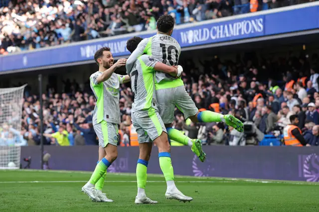 Man City players celebrate goal