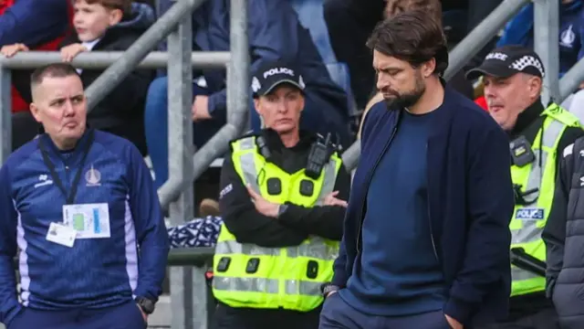 Russell Martin suffers on the sidelines in Falkirk