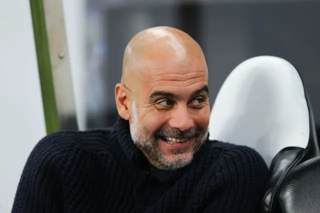 Pep guardiola smiles