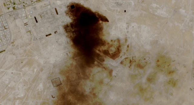 A satellite view of smoke billowing at a Saudi Aramco oil facility after a reported attack, following the announcement of a two-week ceasefire in the Iran war, in Abqaiq, Saudi Arabia April 8, 2026.