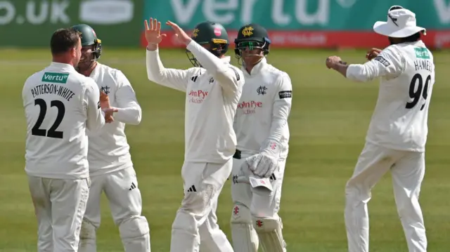 Liam Patterson-White of Nottinghamshire celebrates taking a wicket