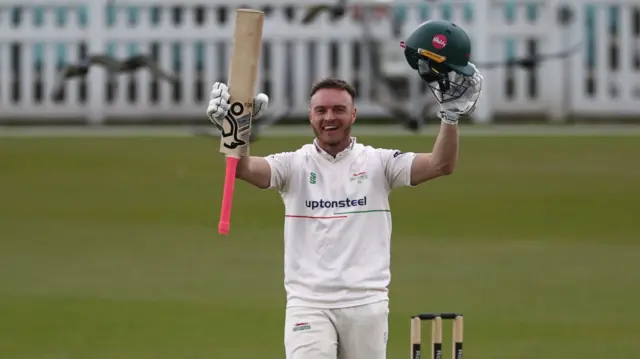 Ben Cox celebrates his century for Leicestershire at Surrey