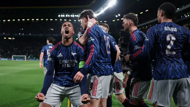 Gabriel celebrates with Arsenal team-mates
