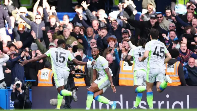 Manchester City players and fans celebrate
