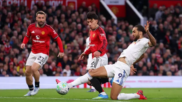 Dominic Calvert-Lewin makes a sliding effort at goal