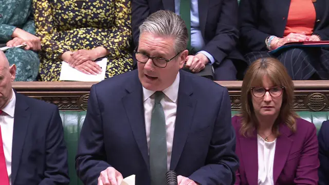 Keir Starmer speaks at the dispatch box in the House of Commons. Chancellor Rachel Reeves sits next to him