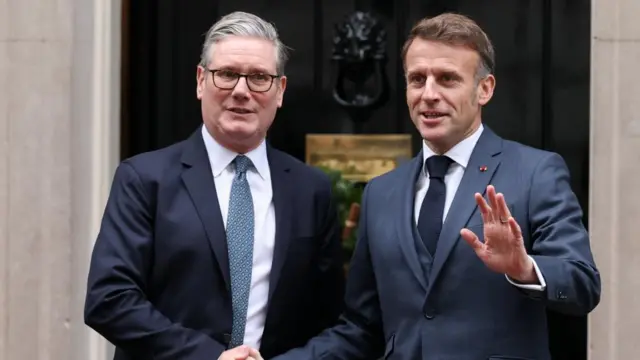 Starmer and Macron shaking hands outside Downing Street