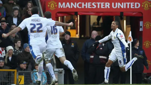 Jermaine Beckford celebrates at Old Trafford