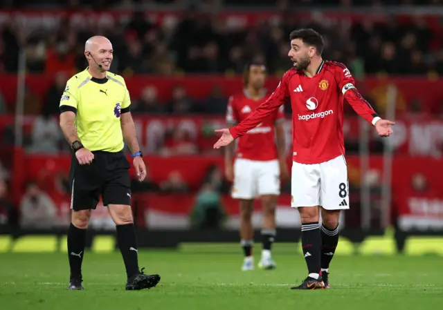 Bruno Fernandes complains to referee Paul Tierney