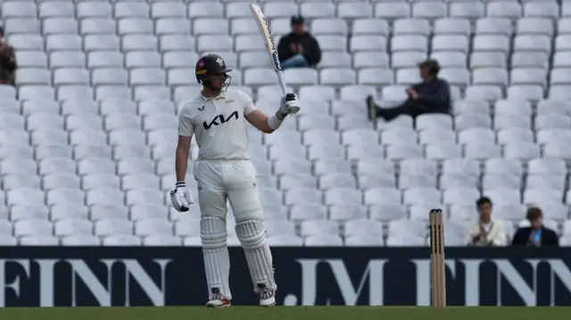 Jamie Smith raises his bat for Surrey against Leics