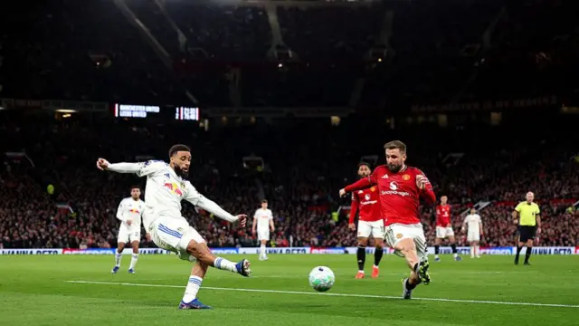 Luke Shaw attempts to block Jayden Bogle