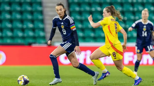 Scotland's Caroline Weir (L) and Belgium's Valesca Ampoorter (R) in action