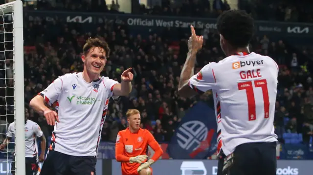 Johnny Kenny celebrates scoring Bolton's second goal against Stevenage