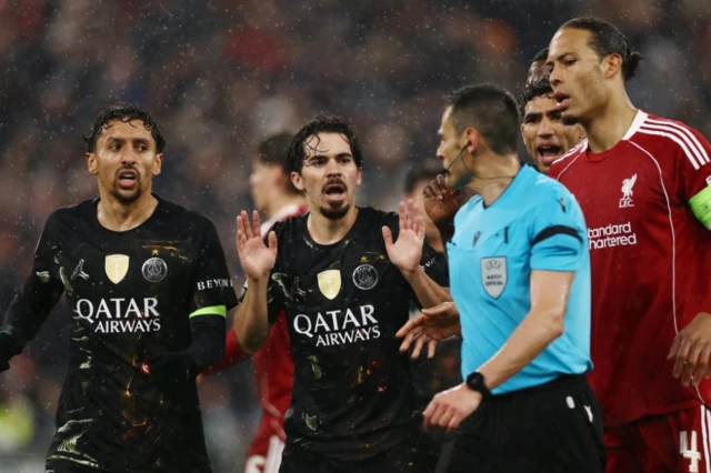 Paris St Germain's Marquinhos remonstrates with referee Laurent Bonadei after he awards