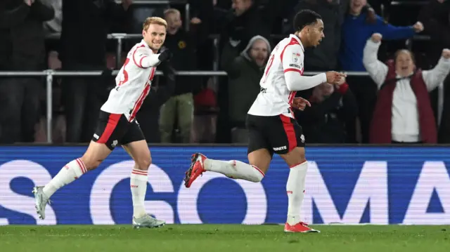 Leo Scienza and Cameron Archer celebrate