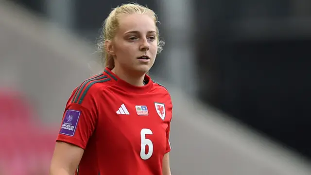Mayzee Davies playing for Wales