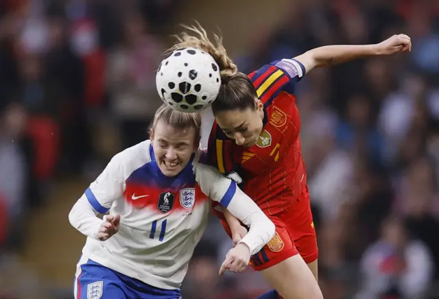 England's Lauren Hemp in action with Spain's Olga Carmona