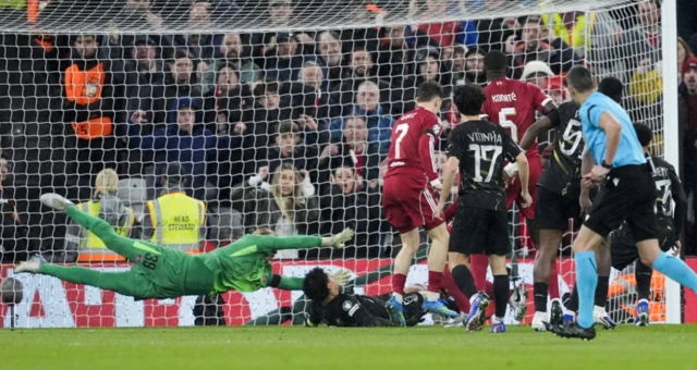 Paris Saint-Germain's Marquinhos clears to prevent a Liverpool goal