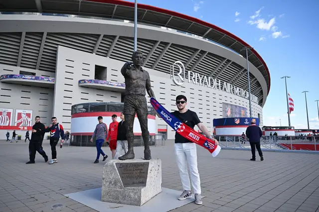 Man with half and half scarf at Estadio Metropolitano
