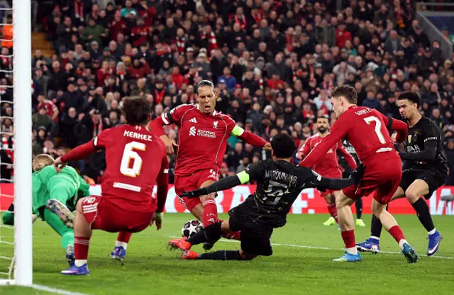 Virgil van Dijk of Liverpool has a shot blocked by Marquinhos
