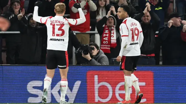 Cameron Archer celebrates with Leo Scienza