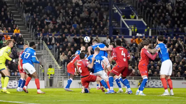Conor Shaughnessy heading in Portsmouth's first goal