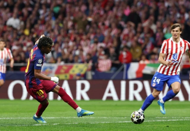 FC Barcelona's Lamine Yamal scores their first