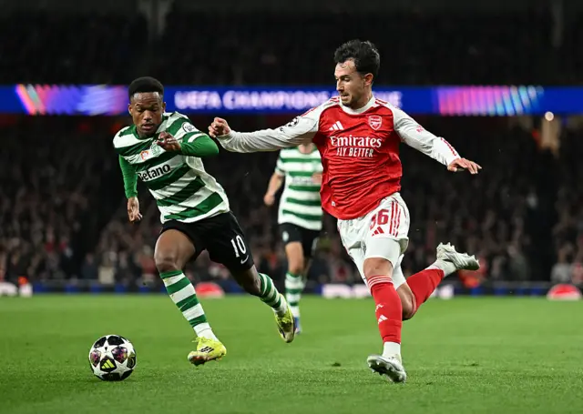 Geny Catamo of Sporting Clube de Portugal and Martin Zubimendi of Arsenal compete