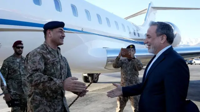 Pakistan's military chief Asim Munir, greeted by Iran's foreign minister Seyed Abbas Araghchi.