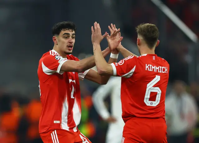 Bayern Munich's Aleksandar Pavlovic scores their first goal