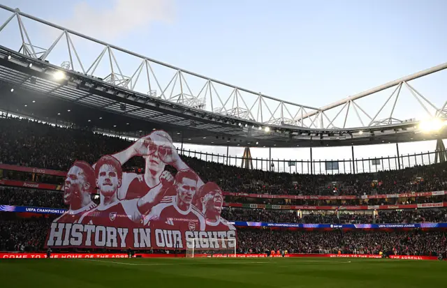 A general view inside the stadium as a tifo is shown.