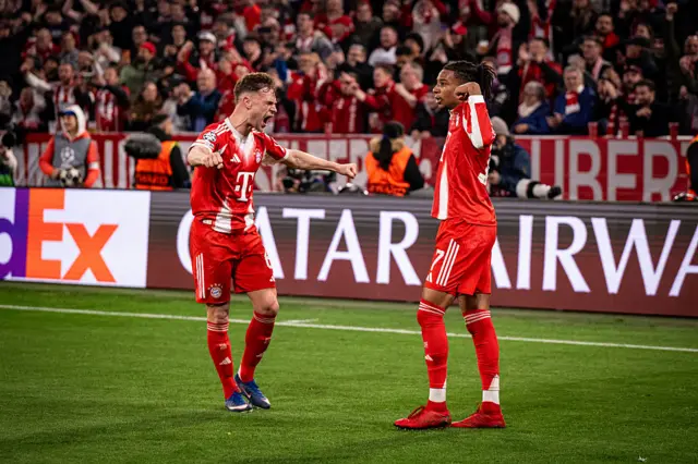 Michael Olise of FC Bayern Muenchen celebrates scoring his team's fourth goal