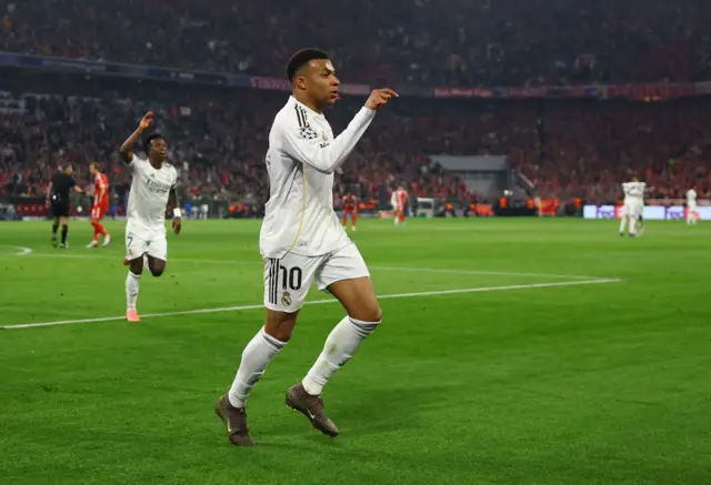 Real Madrid's Kylian Mbappe celebrates scoring their third goal