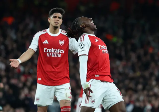 Arsenal's Eberechi Eze and Piero Hincapie react
