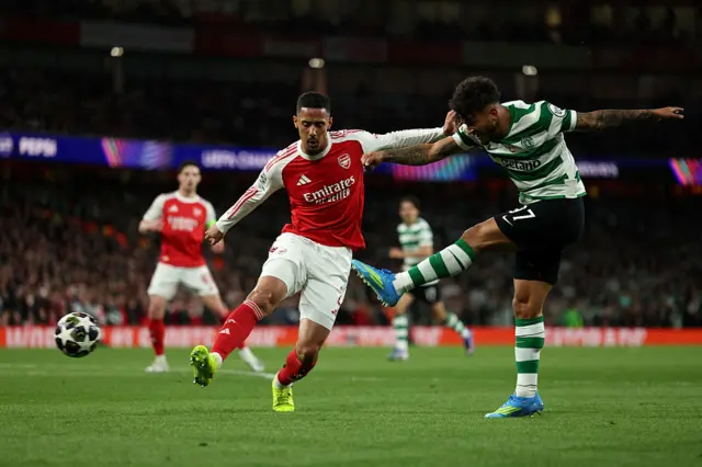 Sporting Lisbon's Colombian striker #97 Luis Suarez shoots past Arsenal's French defender #02 William Saliba