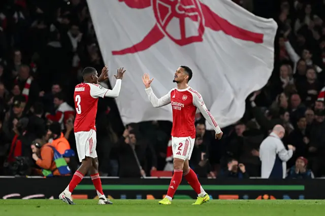Cristhian Mosquera and William Saliba of Arsenal celebrate