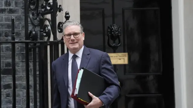 Keir Starmer walks out of No 10 Downing Street