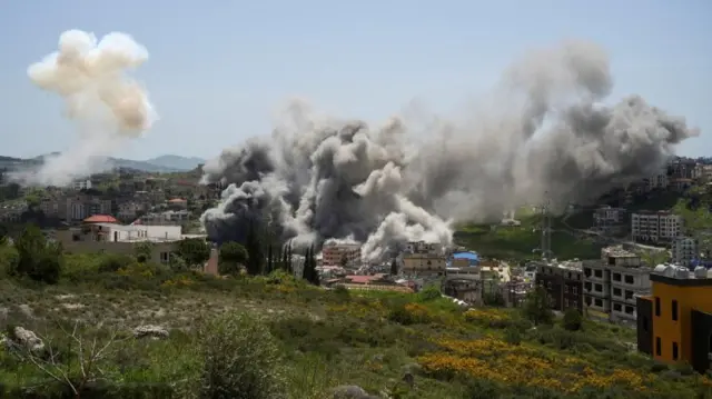 Smoke rises following an Israeli strike in Nabatieh, Lebanon