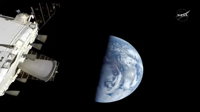 A handout screen grab taken from a video and made available on 10 April 2026 at 16:16 CST by the National Aeronautics and Space Administration (NASA) shows Earth as seen from the Orion spacecraft 'Integrity' during its approach to re-entry, 10 April 2026. The spacecraft is expected to reach speeds of up to Mach 32 during atmospheric re-entry. Artemis II spacecraft approaches re-entry to Earth, Space - 10 Apr 2026