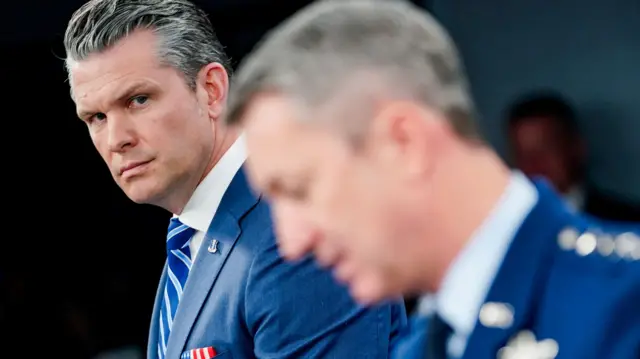 U.S. Secretary of Defence Pete Hegseth and Chairman of the Joint Chiefs of Staff General Dan Caine hold a briefing on the Iran war, at the Pentagon in Washington, D.C., U.S., April 16, 2026.