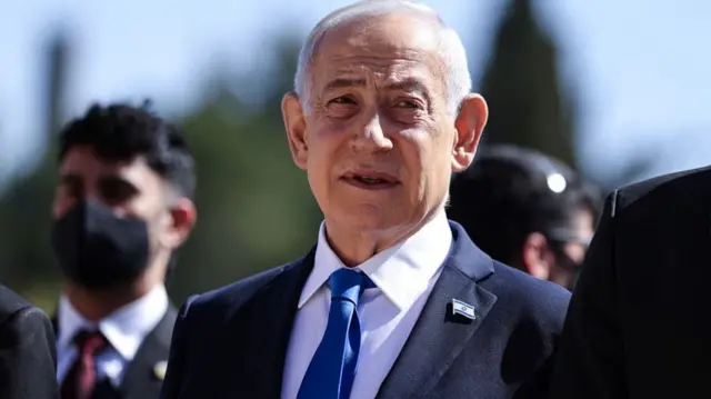 Israel's Prime Minister Benjamin Netanyahu attends a wreath-laying ceremony marking the annual Holocaust Remembrance Day at the Yad Vashem Holocaust Memorial Museum in Jerusalem on April 14, 2026