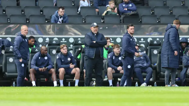 A photo of the Bromley bench looking on at their match against MK Dons
