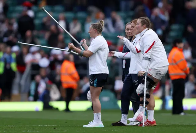Natasha Hunt and Morwenna Talling on crutches