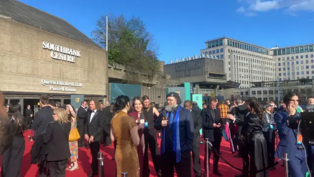 Crowds gather on the red carpet at Bafta Games Awards