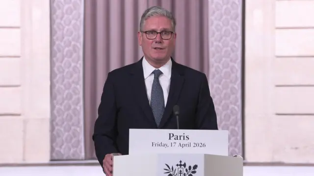 Stamrer speaking at news conference