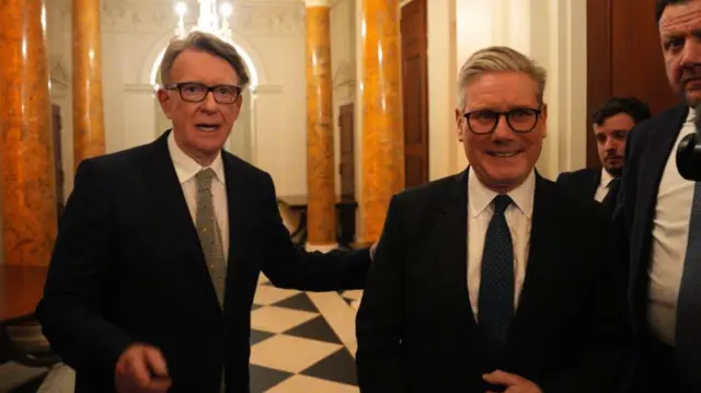 Keir Starmer (right) with former UK ambassador to the US Peter Mandelson during a welcome reception at the ambassador's residence on February 26, 2025 in Washington, DC.