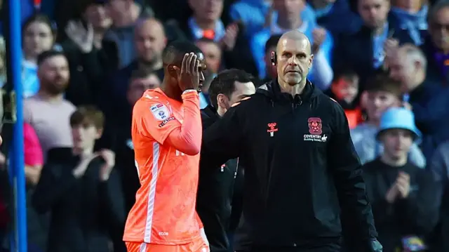 Coventry's Frank Onyeka is given treatment