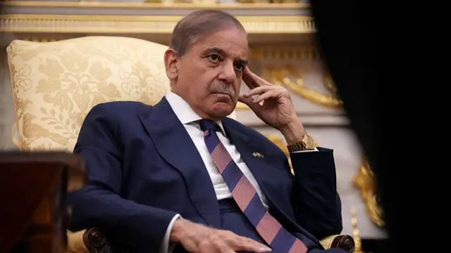 Prime Minister of Pakistan Shehbaz Sharif looks on as U.S. President Donald Trump speaks to reporters in the Oval Office of the White House on September 25, 2025 in Washington, DC