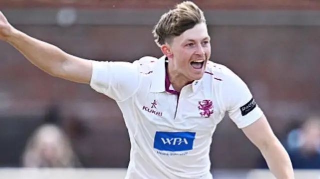 Alfie Ogborne celebrates a wicket